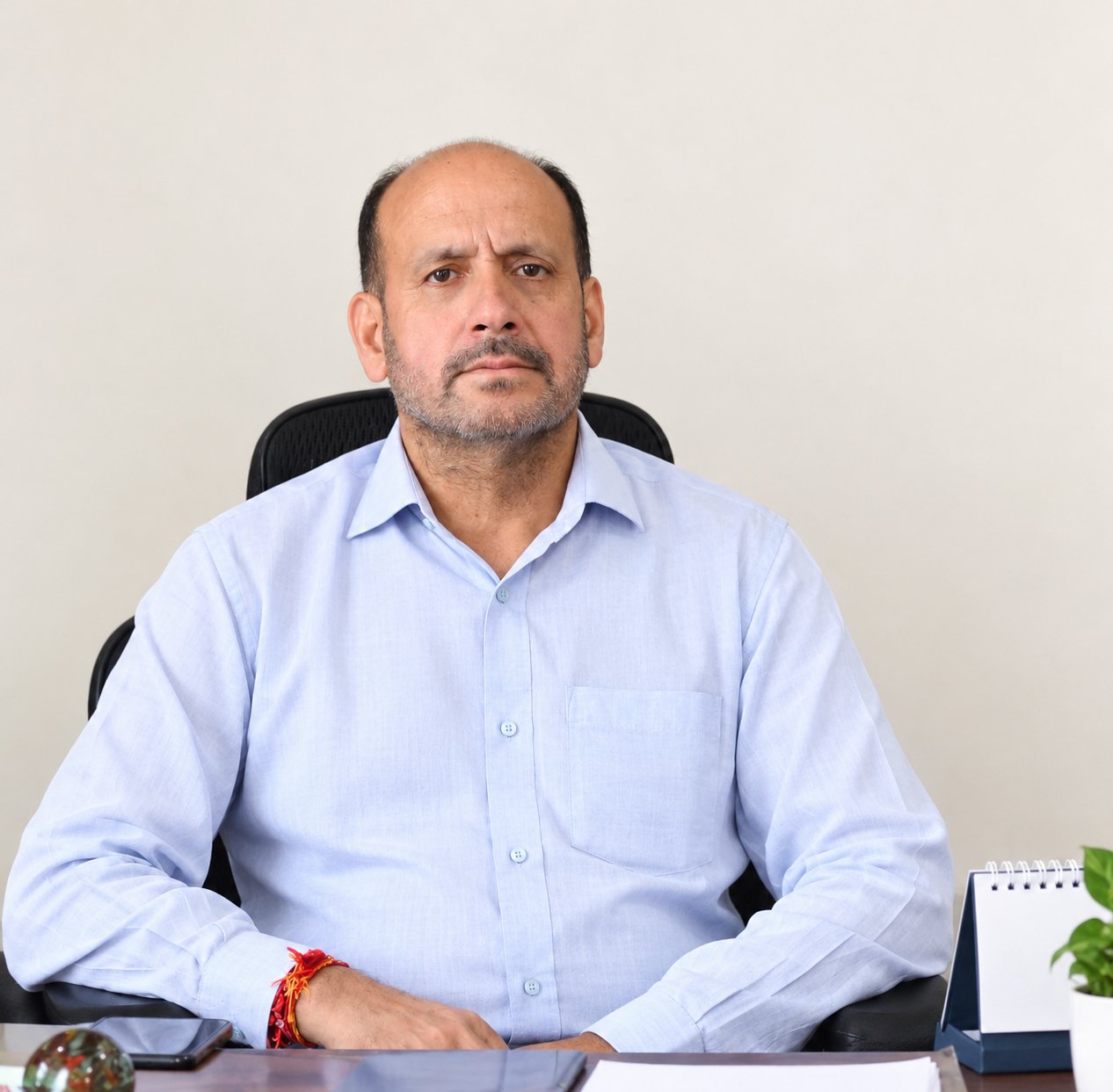Shri Surinder Katoch — Director & Principal, AIER